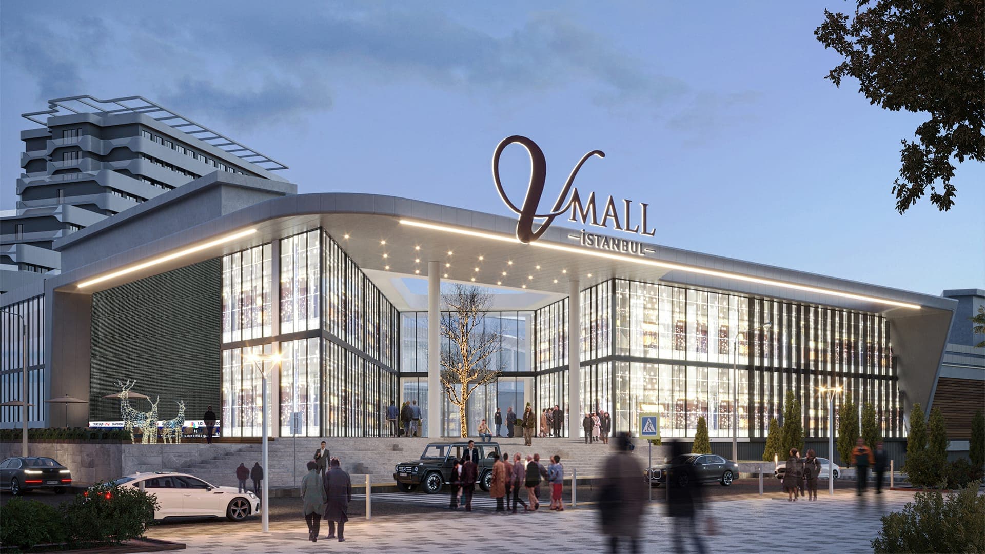 V Mall İstanbul'un aydınlatılmış cam giriş cephesi ve çatı logosu, akşam render görseli